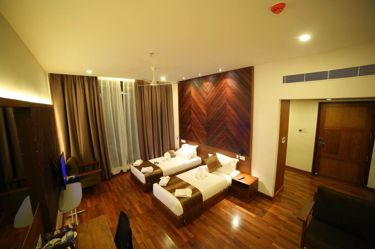 Woodies Bleisure Hotel 코지코드 외부 사진